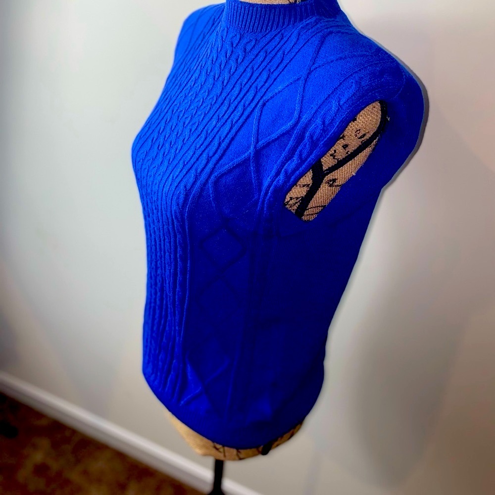 Rich B. blue top